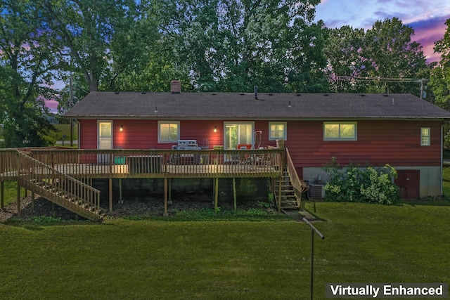 4587 E Farm Road 136, Springfield, MO 65809 - back of property at dusk featuring stairway, a wooden deck, a chimney, and a yard