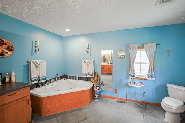 4587 E Farm Road 136, Springfield, MO 65809 - full bathroom with a tub with jets, a textured ceiling, vanity, toilet, and visible vents