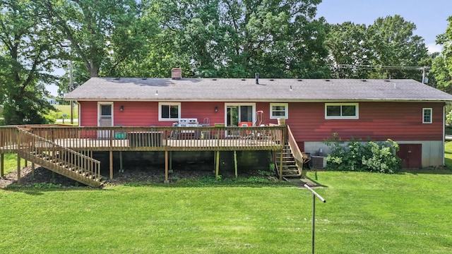 4587 E Farm Road 136, Springfield, MO 65809 - rear view of house with a wooden deck, a yard, central air condition unit, and stairs