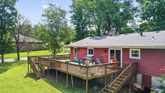 4587 E Farm Road 136, Springfield, MO 65809 - back of house featuring stairway, a chimney, a shingled roof, a yard, and a wooden deck