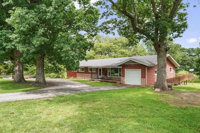 4587 E Farm Road 136, Springfield, MO 65809 - ranch-style home with an attached garage, driveway, and a front yard