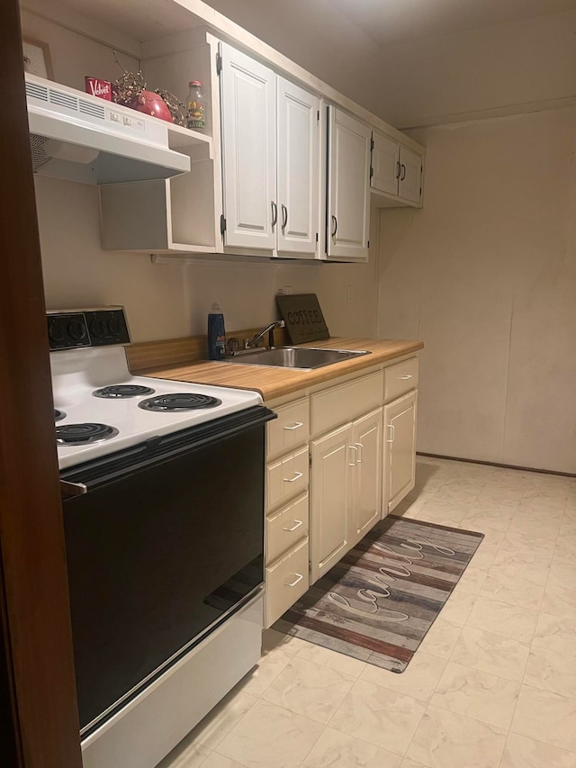 kitchen featuring white electric range oven, white cabinetry, sink, and extractor fan