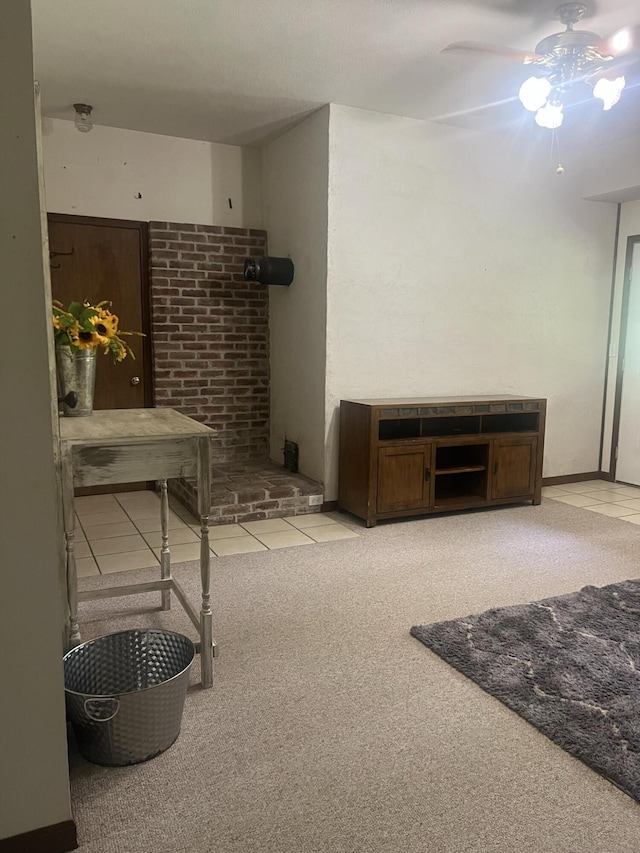 miscellaneous room with a ceiling fan and light colored carpet