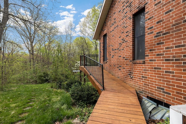 view of home's exterior with brick siding