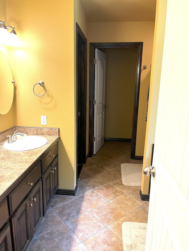 2800 Briaroaks Ln, Joplin, MO 64804 - bathroom with vanity and baseboards