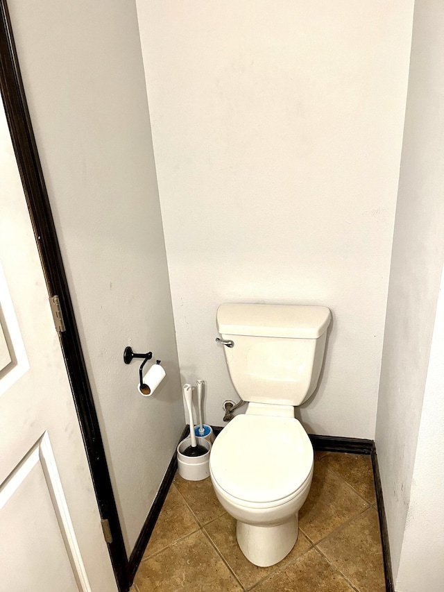2800 Briaroaks Ln, Joplin, MO 64804 - bathroom with tile patterned flooring, toilet, and baseboards