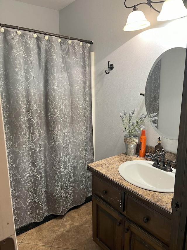2800 Briaroaks Ln, Joplin, MO 64804 - bathroom featuring vanity, tile patterned flooring, and curtained shower