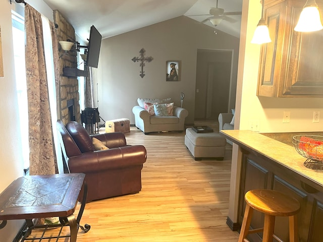 2800 Briaroaks Ln, Joplin, MO 64804 - living area with ceiling fan, vaulted ceiling, and light wood-style flooring