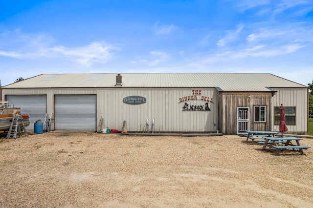 garage with wood walls