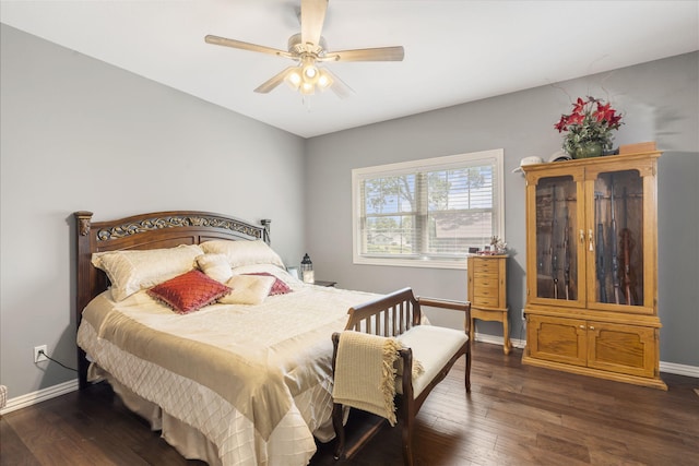 bedroom featuring ceiling fan and dark hardwood / wood-style flooring