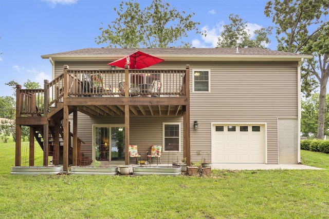 rear view of house with a garage, a wooden deck, and a lawn