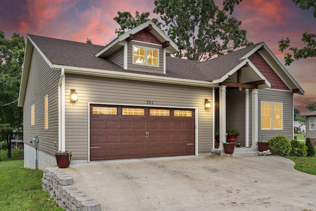 craftsman-style house featuring a garage