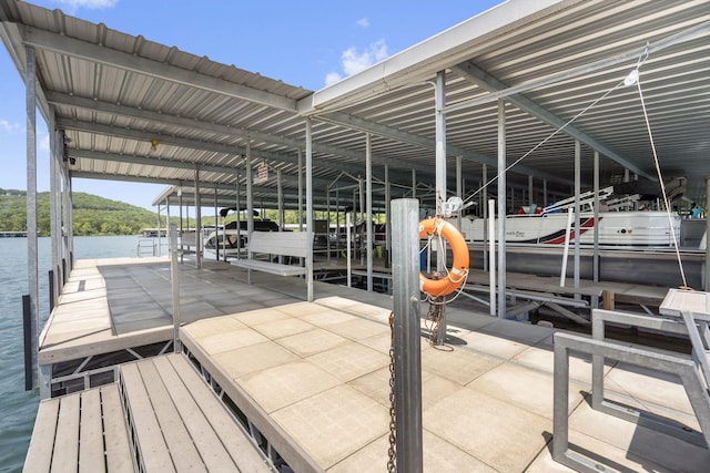 view of dock with a water view