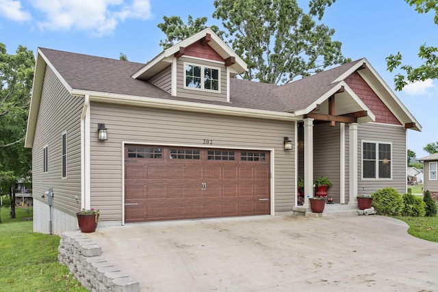 craftsman-style house featuring a garage