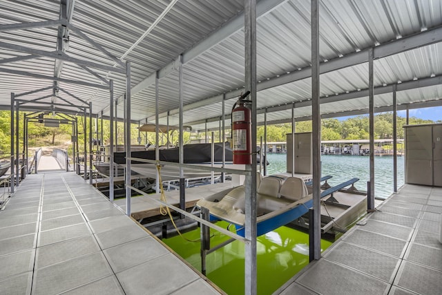 dock area featuring a water view