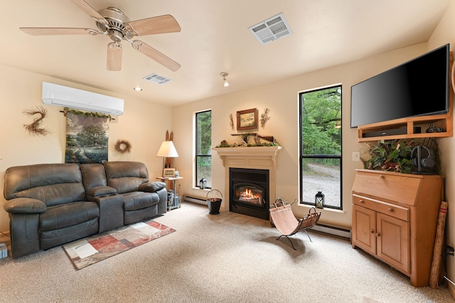 carpeted living room featuring ceiling fan, an AC wall unit, a baseboard heating unit, and a healthy amount of sunlight