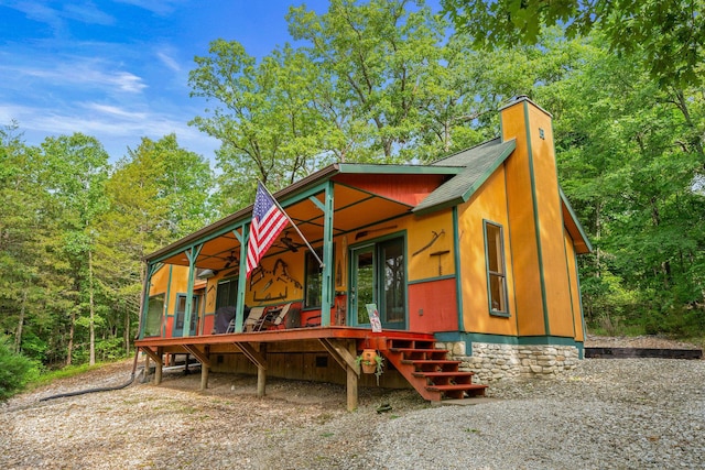 228 Cabin Ln, Kissee Mills, MO 65680 - view of front of house with a chimney and roof with shingles