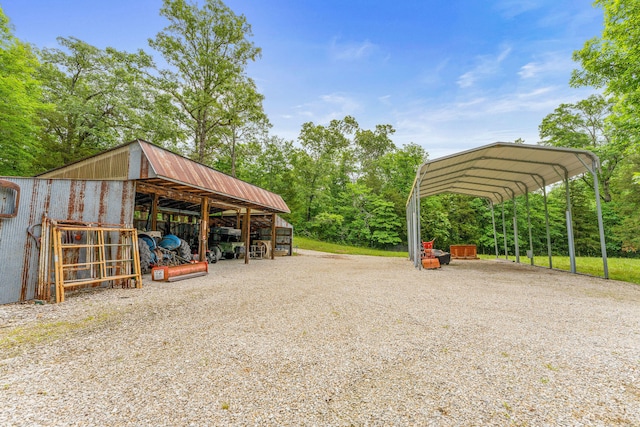 view of parking / parking lot with a carport