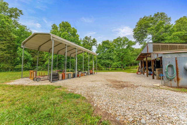 view of home's community featuring an outbuilding