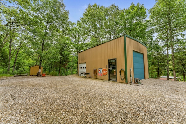 view of outdoor structure featuring a garage