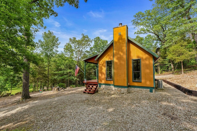 228 Cabin Ln, Kissee Mills, MO 65680 - view of side of property with a chimney