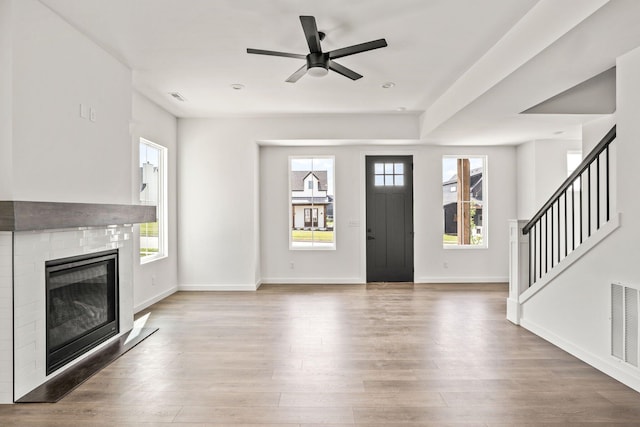 entryway featuring hardwood / wood-style flooring and ceiling fan