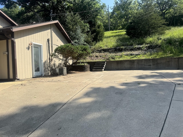 view of property exterior with cooling unit