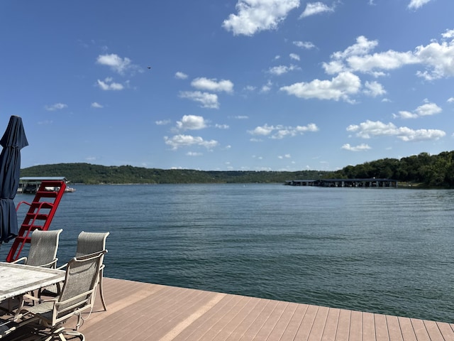 view of dock with a water view
