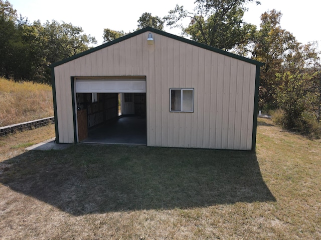 garage with a yard