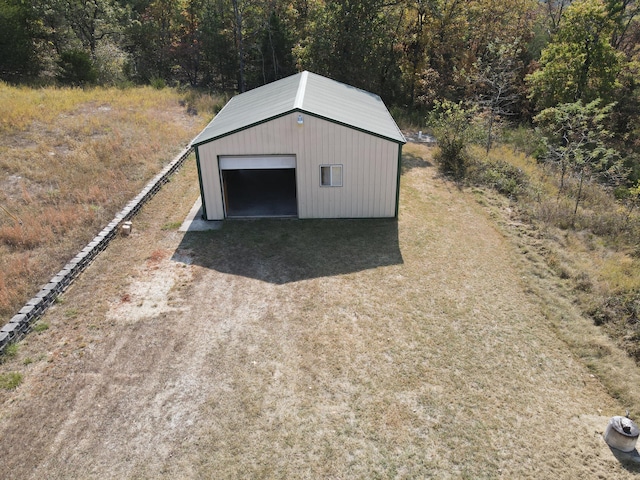 view of outdoor structure with a garage