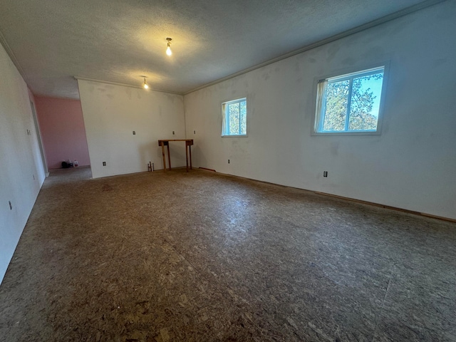 empty room with a textured ceiling