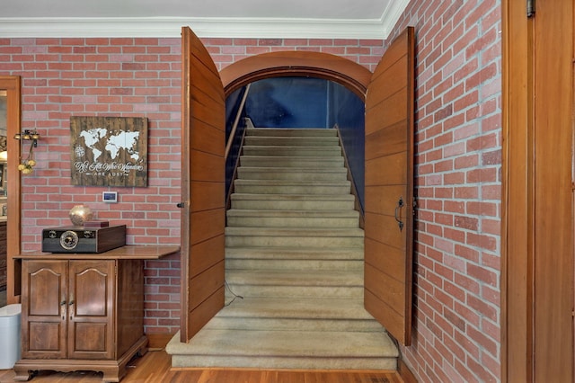 room details featuring hardwood / wood-style floors and crown molding