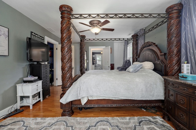 bedroom featuring ceiling fan and light hardwood / wood-style flooring