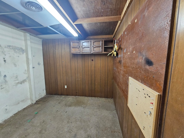 basement with wood walls