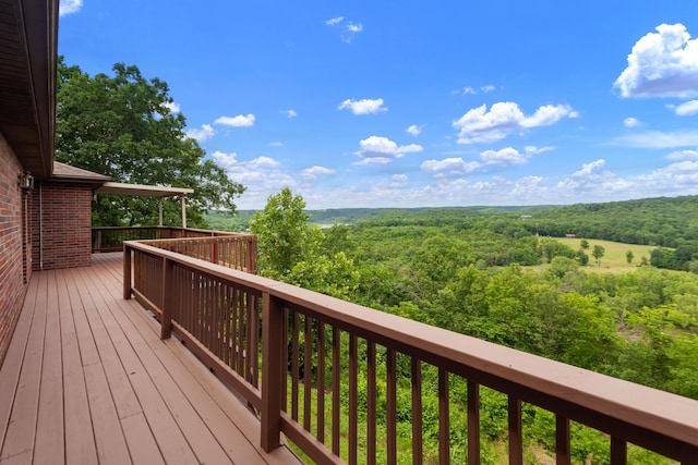 deck with a wooded view