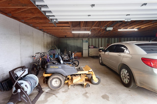 garage featuring a garage door opener