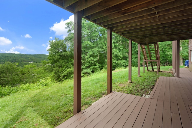 deck featuring a yard