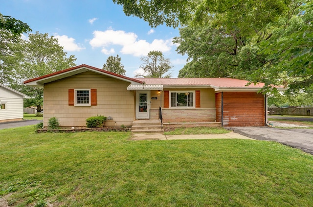 ranch-style home with a front yard