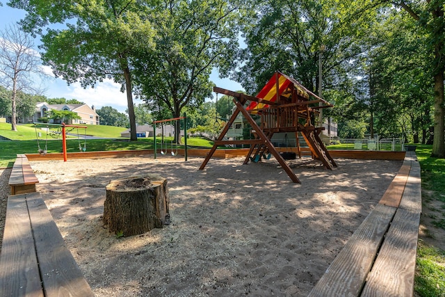 view of jungle gym with a lawn