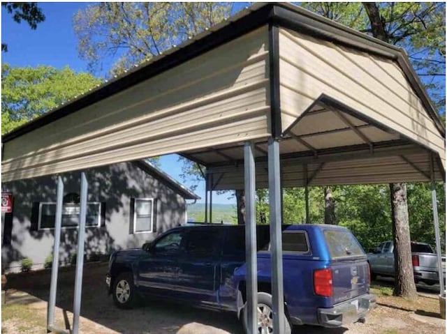 view of car parking featuring a carport