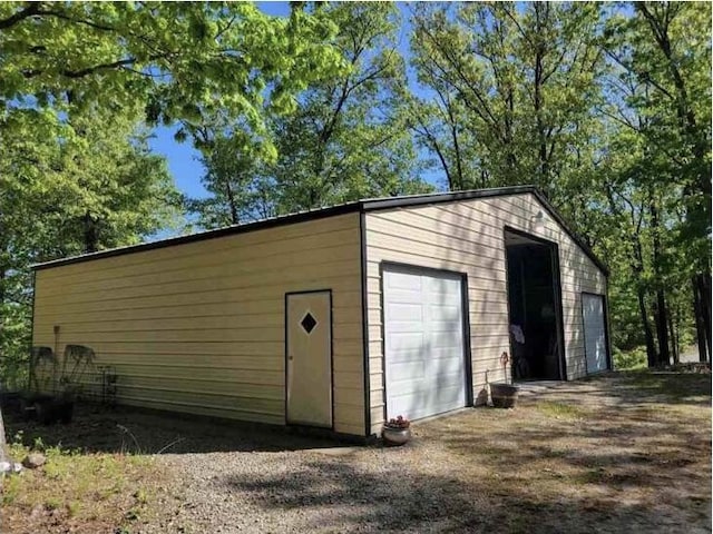 view of outbuilding with a garage