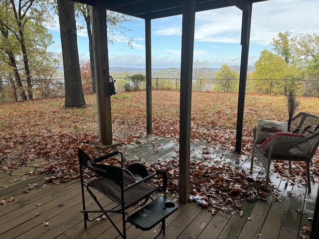 wooden terrace with a mountain view