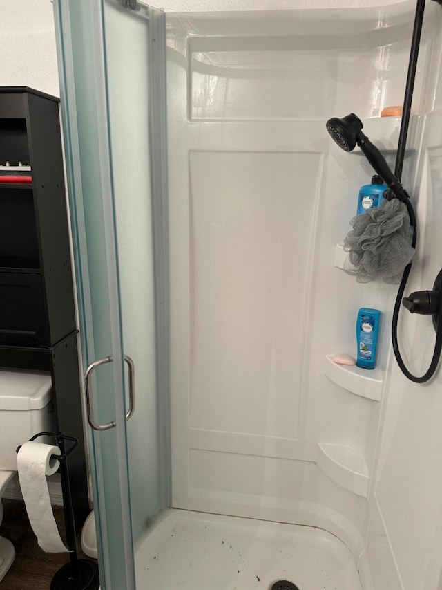 bathroom with an enclosed shower