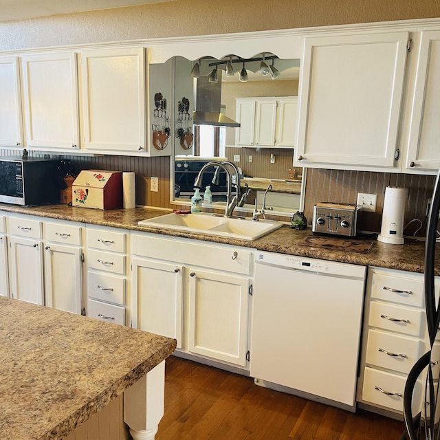 kitchen featuring white cabinetry, white dishwasher, dark hardwood / wood-style flooring, and sink