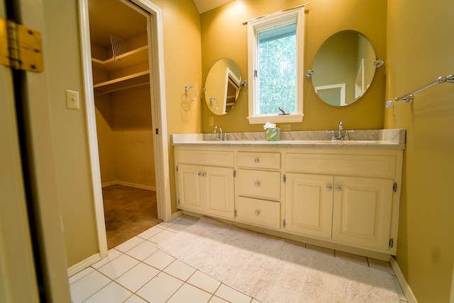 bathroom with vanity and tile patterned floors