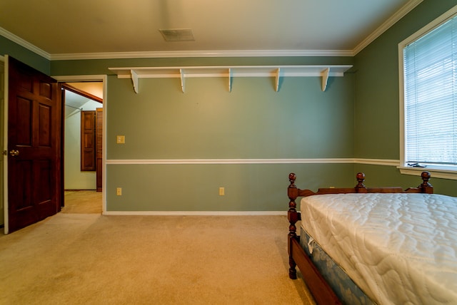 unfurnished bedroom featuring light colored carpet and crown molding