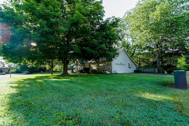 view of yard featuring a garage