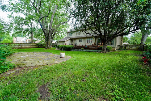 view of yard with a deck