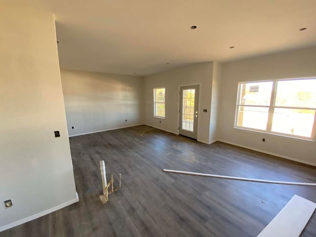 empty room featuring dark hardwood / wood-style floors