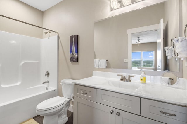 full bathroom with ceiling fan, shower / bathtub combination, vanity, and toilet